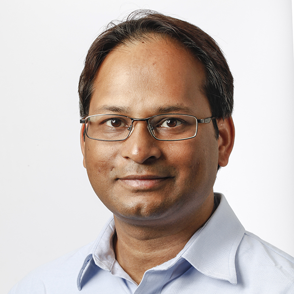 Portrait of Dr. Vivek Kumar against a white background